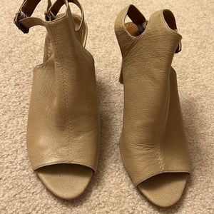 Open toe 9 west size leather shoe .